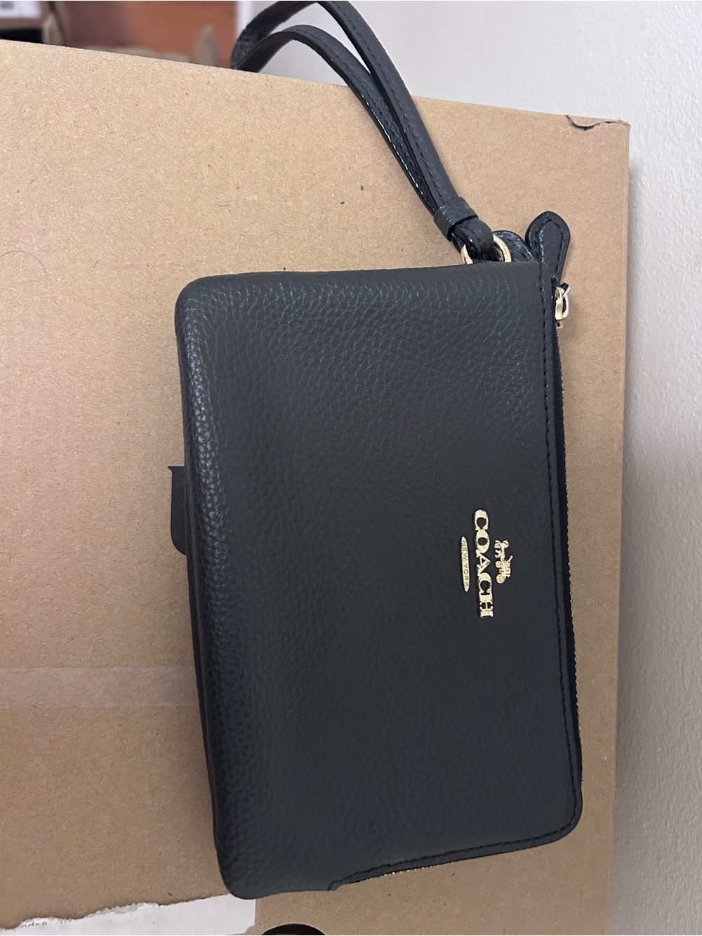 Coach Black Pebbled Leather Wristlet with Gold Logo